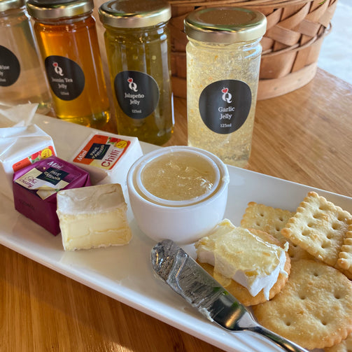 Suggested serving of jelly with cheese and crackers appetizer from Queen of Hearts Tea House and gift shop Kitchener